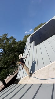 Washing Solar Panels.MOV